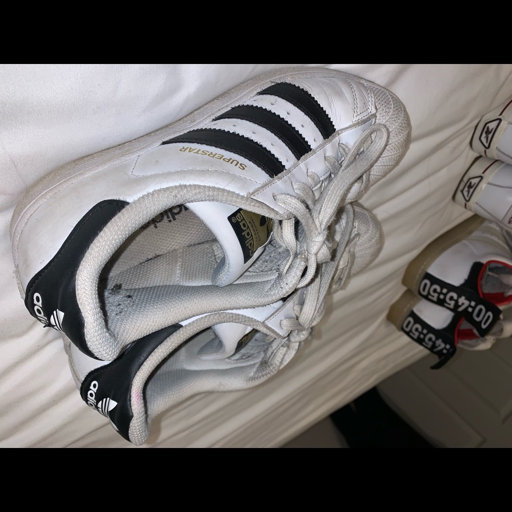 black and white adidas original superstars